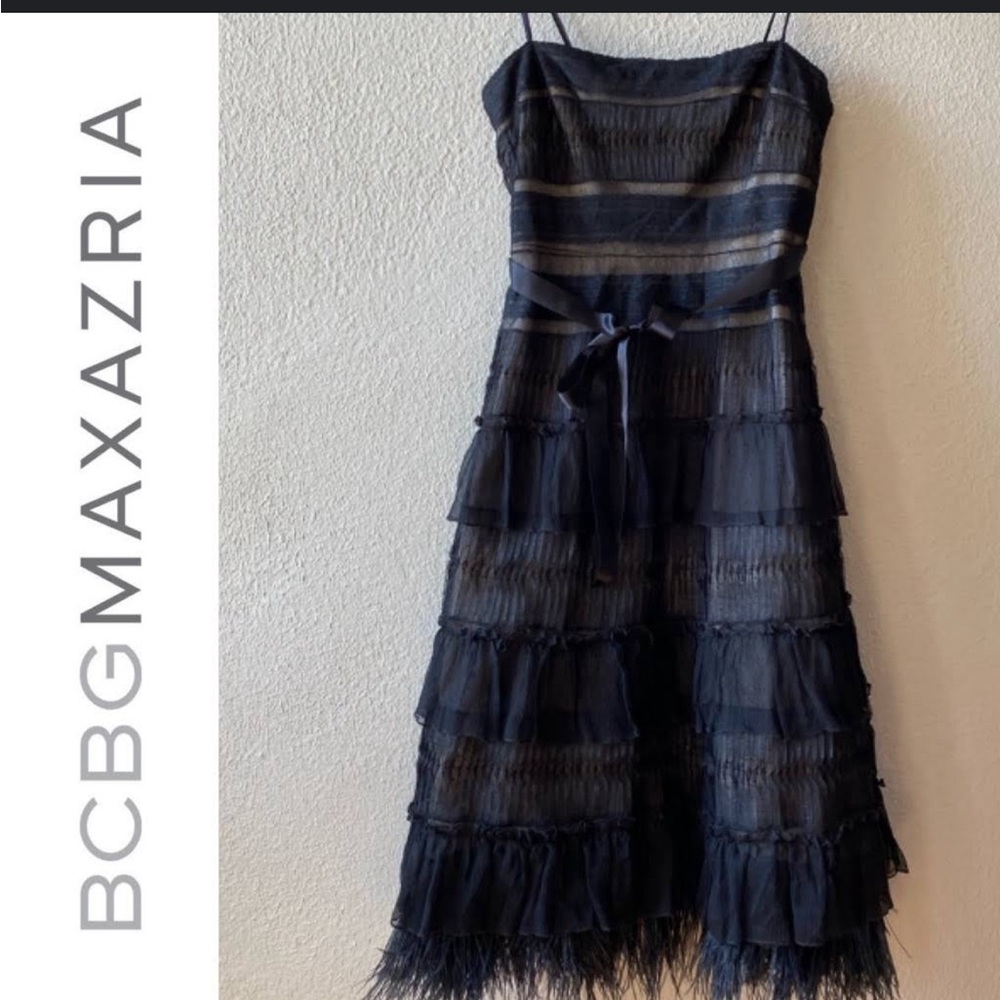 Bcbg cocktail dress size 6. Worn once. Ostrich feather trim.